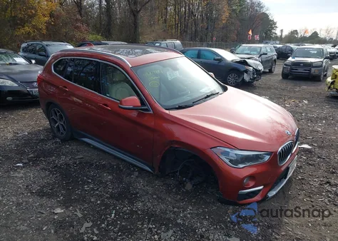 2018 BMW X1 xDrive28I z USA, uszkodzony, nr VIN WBXHT3C37J5K21409